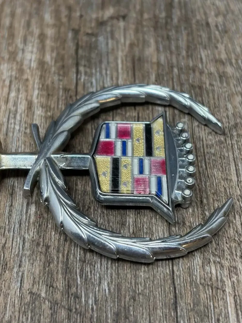 Vintage Iconic GM Cadillac crest and wreath hood ornament emblem with gold birds